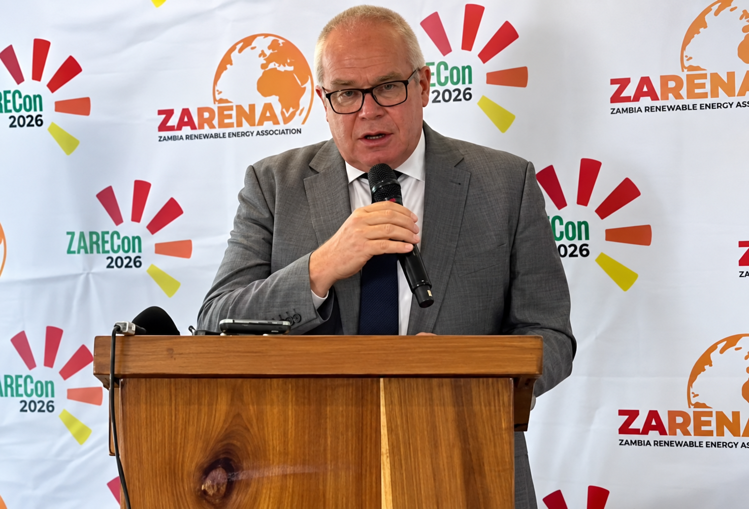 Michael Tarney speaking at a podium
